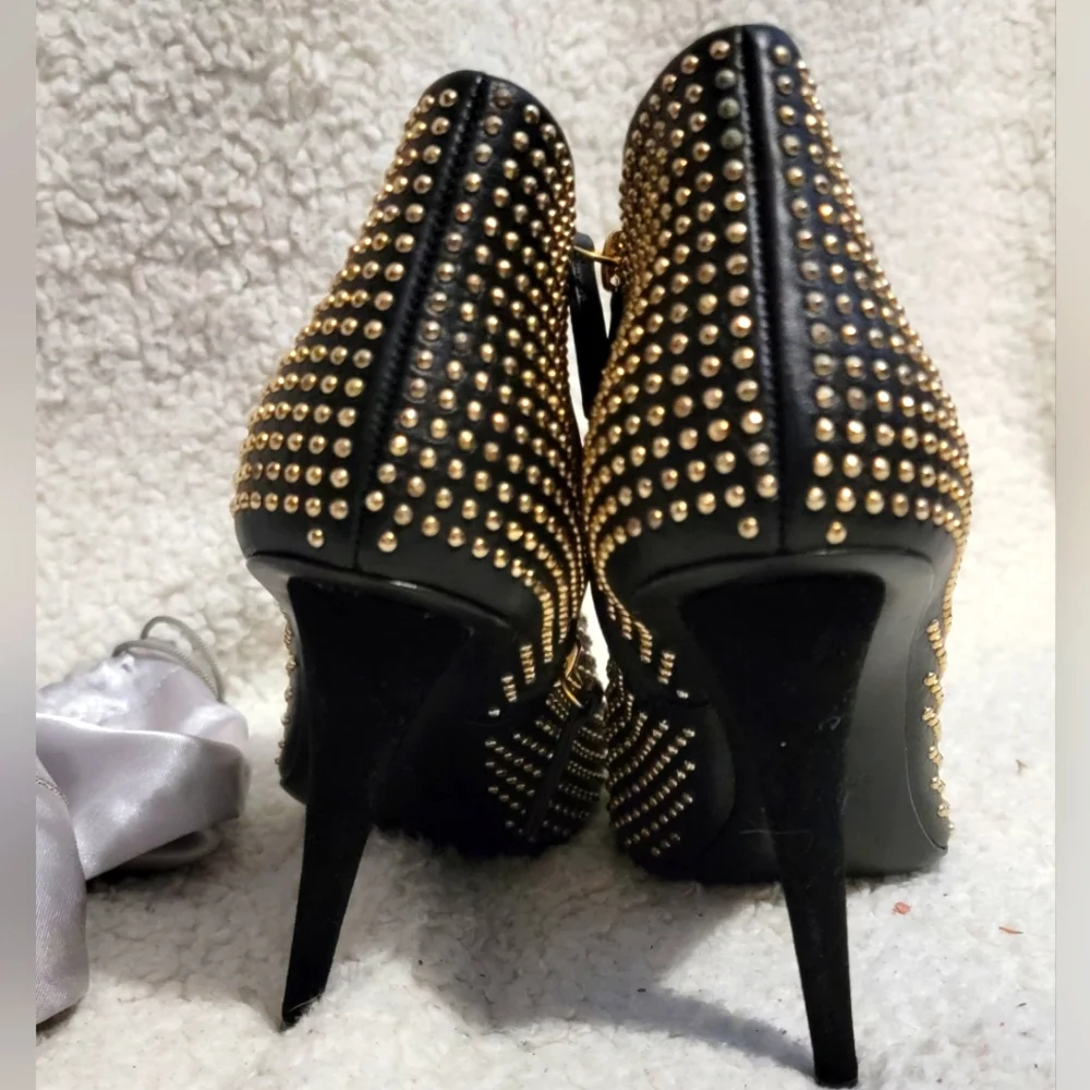 Giuseppe Zanotti  Gorgeous Black and Gold Studded Ankle boot heels 7 1/2 NWOT.